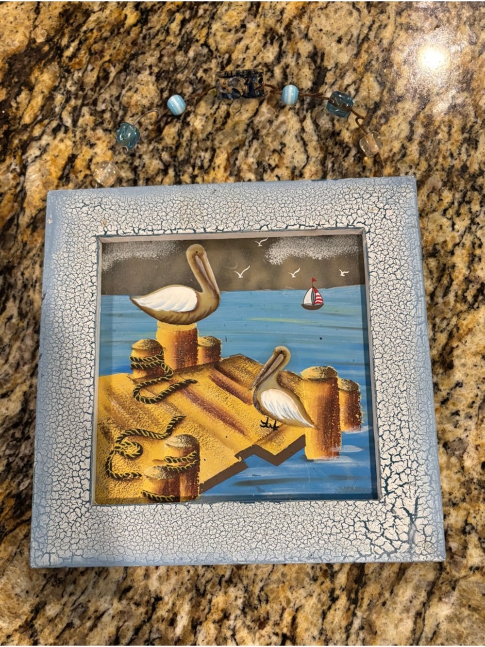 Coastal Pelican Glass Art Wall Plaque in Blue and Gold